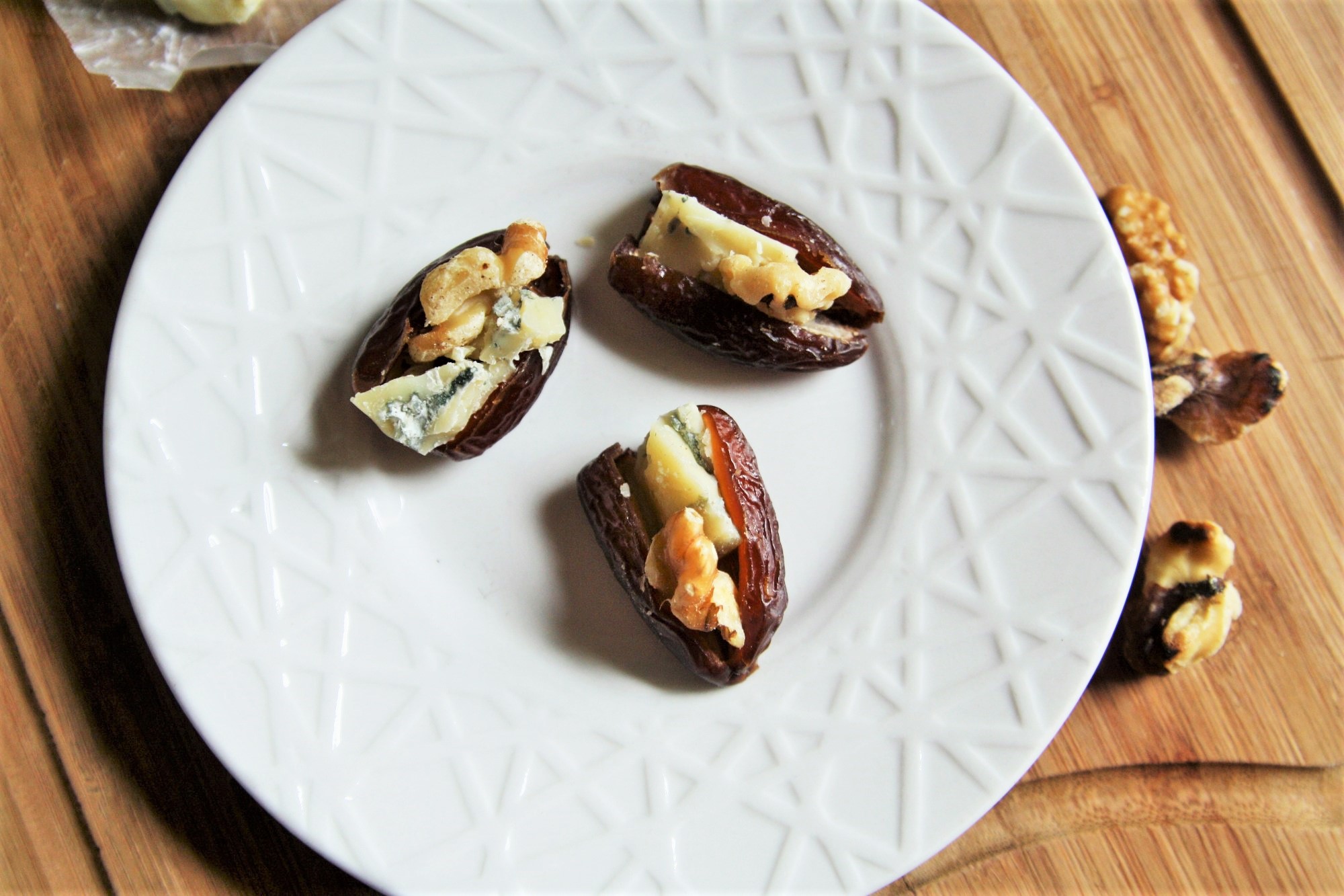 These Blue Cheese and Walnut Stuffed Dates are one those effortless appetizers that never fail to impress - simple, elegant, and the perfect combination of sweet and savory flavors!
