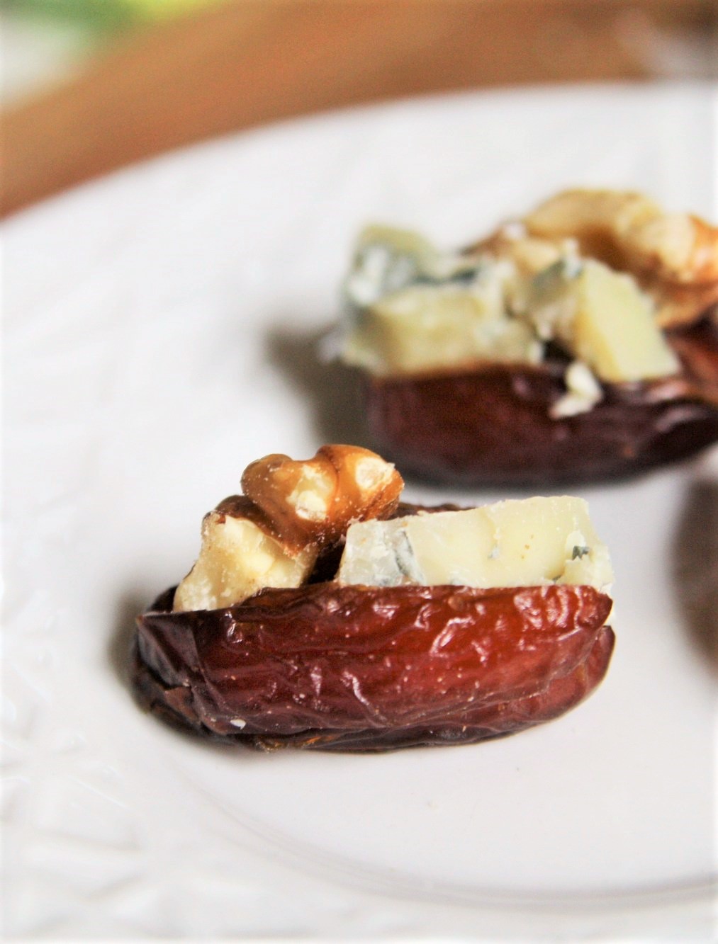 These Blue Cheese and Walnut Stuffed Dates are one those effortless appetizers that never fail to impress - simple, elegant, and the perfect combination of sweet and savory flavors!