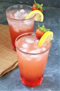 Sweet, tart, and refreshing. Strawberry Pink Lemonade is the drink you want to sip on at the beach, the park, or your Fourth of July cookout!