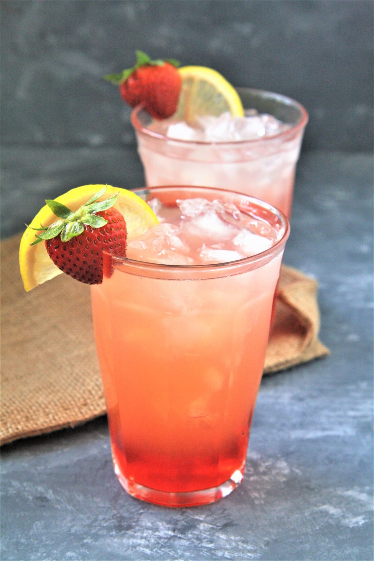 Sweet, tart, and refreshing. Strawberry Pink Lemonade is the drink you want to sip on at the beach, the park, or your Fourth of July cookout!