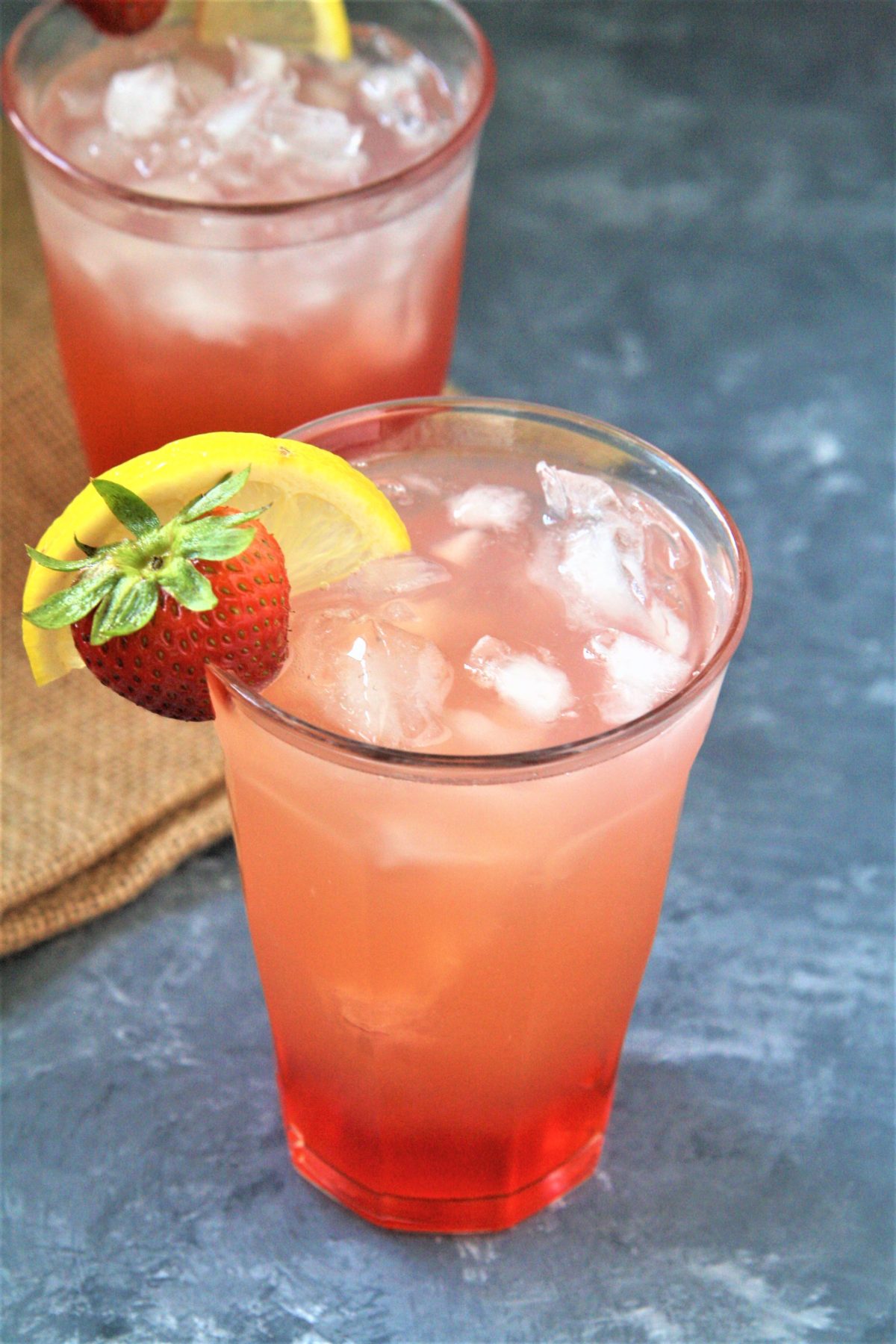 Sweet, tart, and refreshing. Strawberry Pink Lemonade is the drink you want to sip on at the beach, the park, or your Fourth of July cookout!