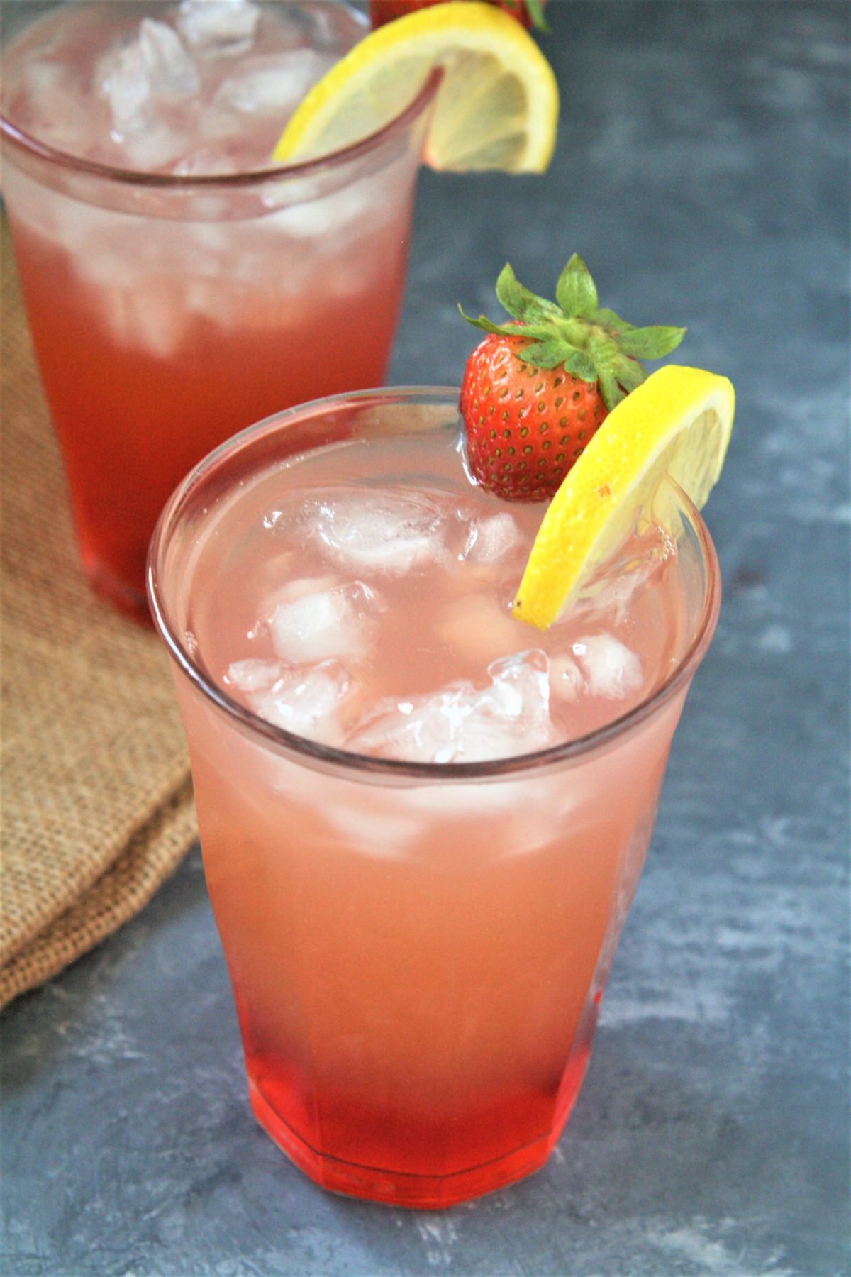 Sweet, tart, and refreshing. Strawberry Pink Lemonade is the drink you want to sip on at the beach, the park, or your Fourth of July cookout!