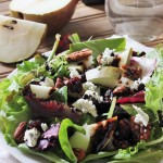 Goat Cheese, Pear, Pecan, and Cranberry Salad with Reduced Balsamic Vinaigrette