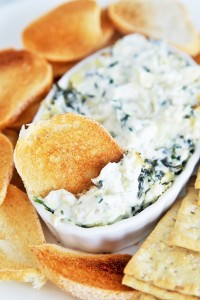 Spinach and artichoke dip is always a crowd pleaser, and this Cheesecake Factory copycat hot spinach and cheese dip is a delicious and easy appetizer you can make at home!