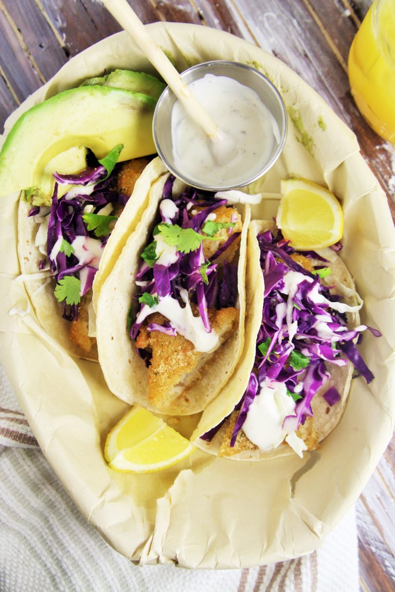 Crispy Fish Tacos with Cabbage Slaw and Lime Crema - The Tasty Bite