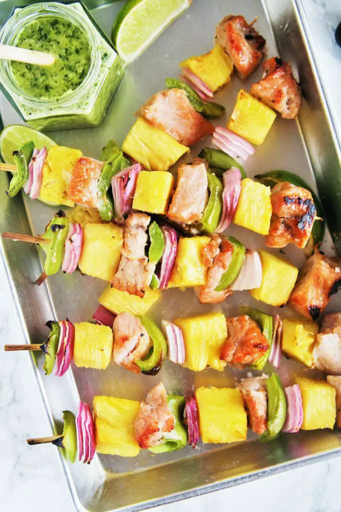 Juicy, tender pork al pastor kebabs skewered with pineapple, peppers, and sweet onions - these skewers are a staple during grilling season and easy enough for any day of the week!