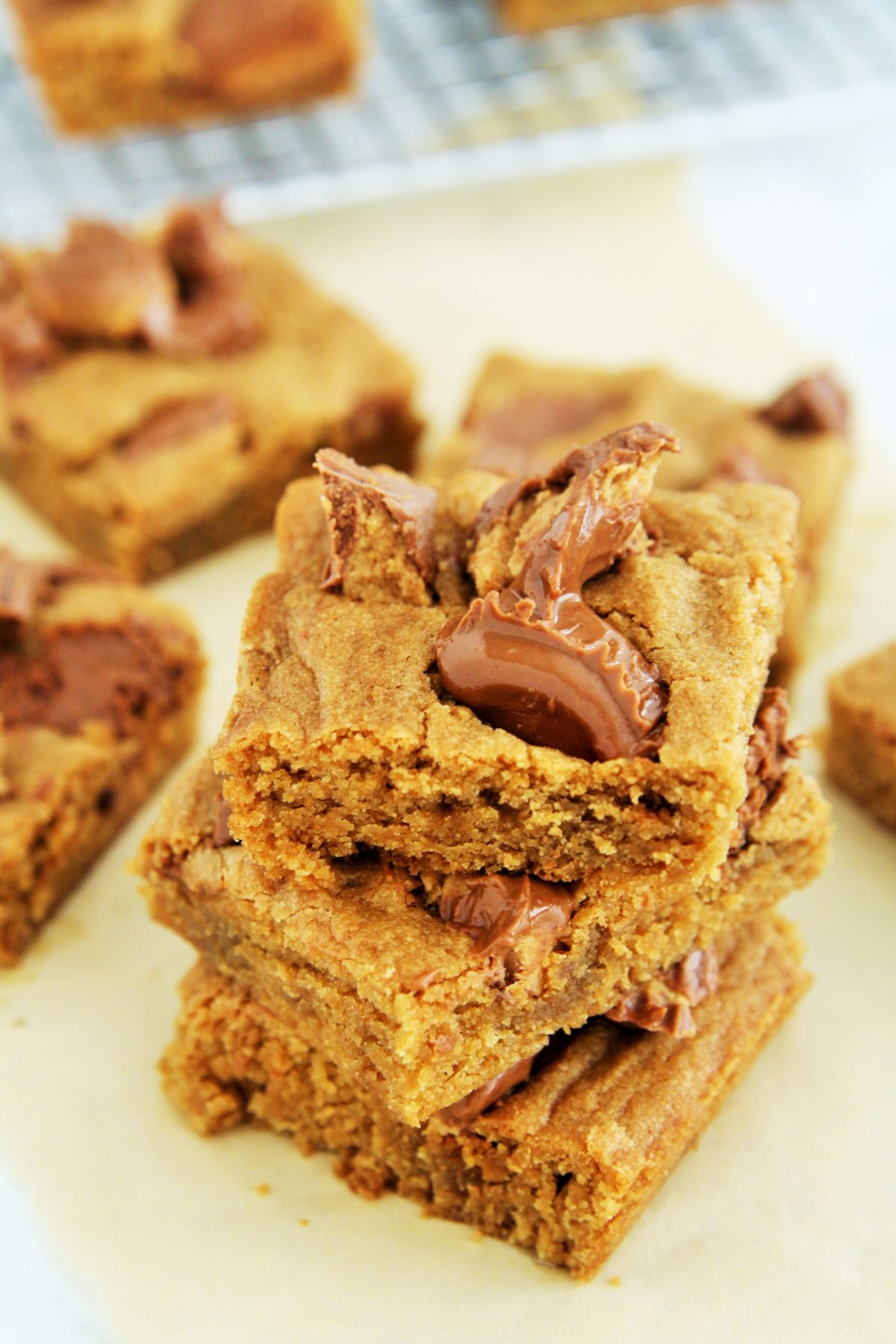 These soft and chewy blondies are bursting with the flavor of chocolate peanut butter cup, perfect treat for pairing with coffee.