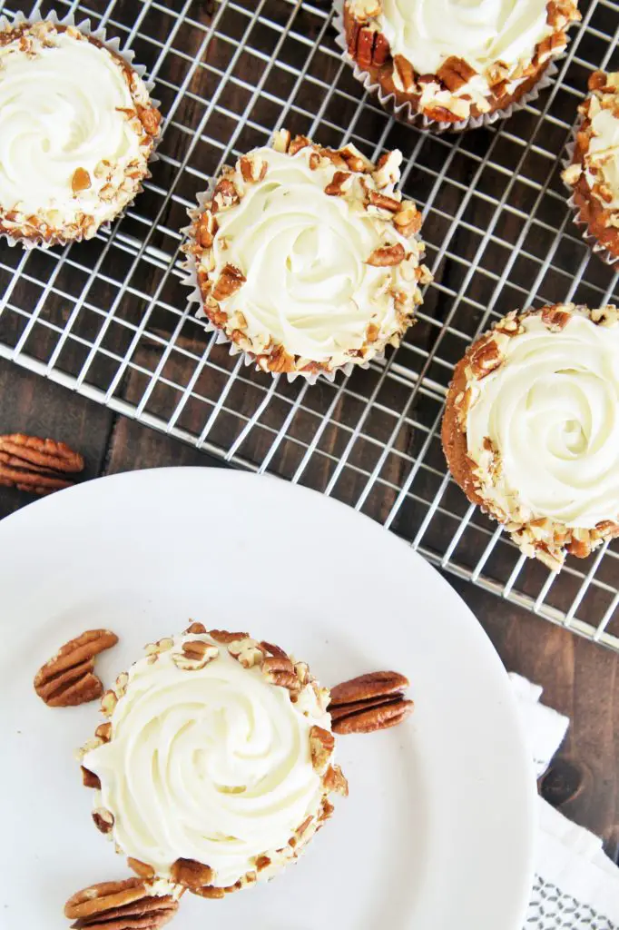 Made with banana, crushed pineapple, coconut and pecans, these Classic Hummingbird Cupcakes are moist, flavorful, and scrumptious.