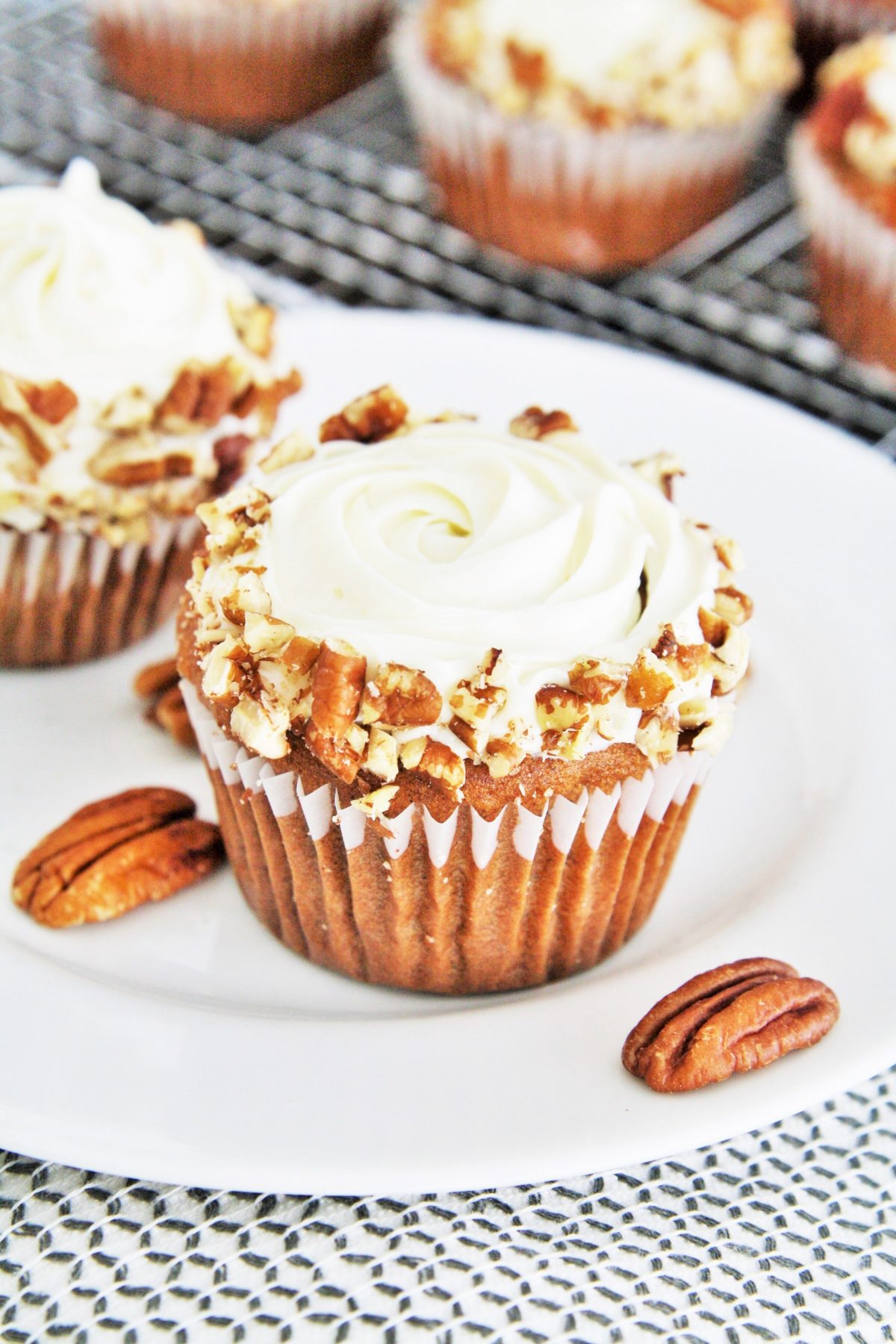 Made with banana, crushed pineapple, coconut and pecans, these Classic Hummingbird Cupcakes are moist, flavorful, and scrumptious.