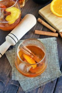 This Japanese Old Fashioned features Suntory Hibiki Whiskey as its star ingredient, complemented by sugar, yuzu bitters for a zesty twist, and a garnish of orange peel.