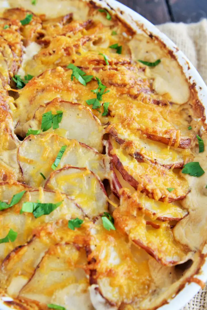 Creamy Potatoes Au Gratin is a perfect side dish for the holidays - it'll easily become a dinnertime staple the whole family will love!