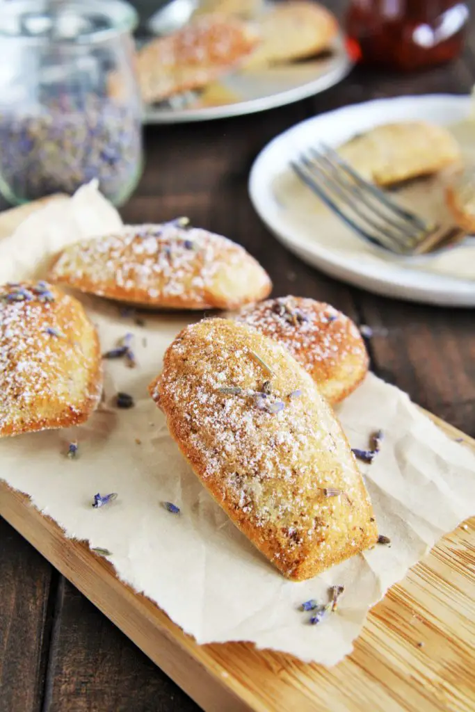 These almond madeleines are infused with the delicate flavors of lavender, honey, and lemon - enjoy with a cup of tea for relaxation. 