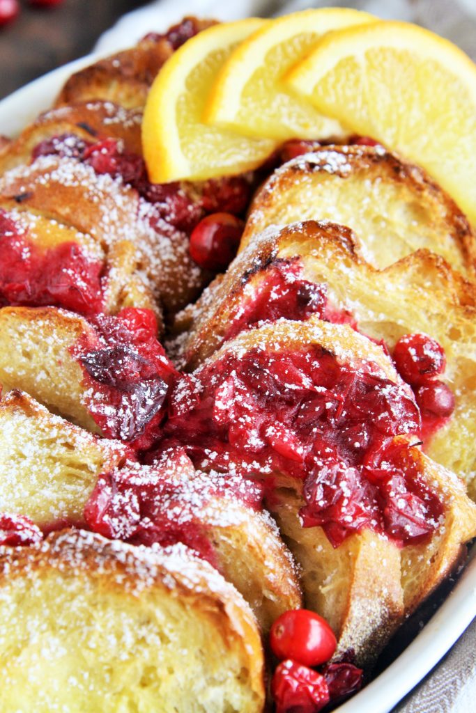 Wake up to this delicious Cranberry Orange French Toast Bake, a festive overnight breakfast casserole perfect for holiday morning!