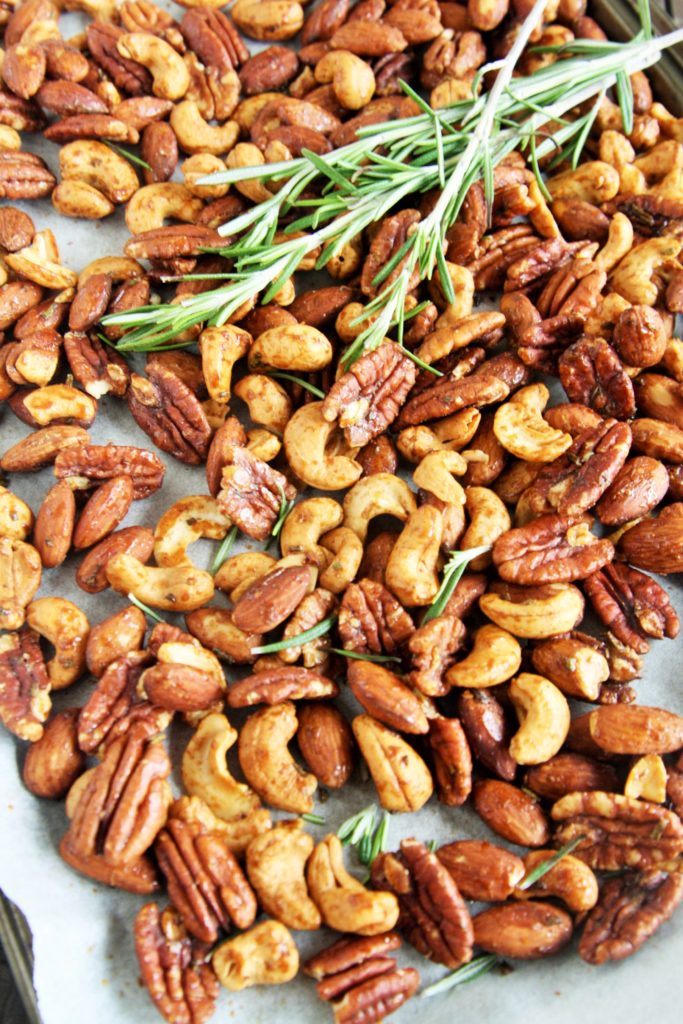 These Rosemary Honey Roasted Nuts are savory, sweet, and totally addicting thanks to the rosemary and cayenne pepper, with a touch of honey for sweetness.