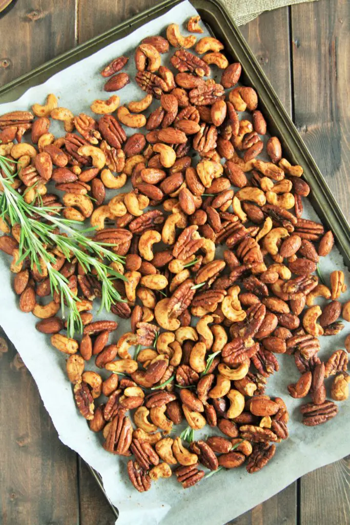 These Rosemary Honey Roasted Nuts are savory, sweet, and totally addicting thanks to the rosemary and cayenne pepper, with a touch of honey for sweetness.
