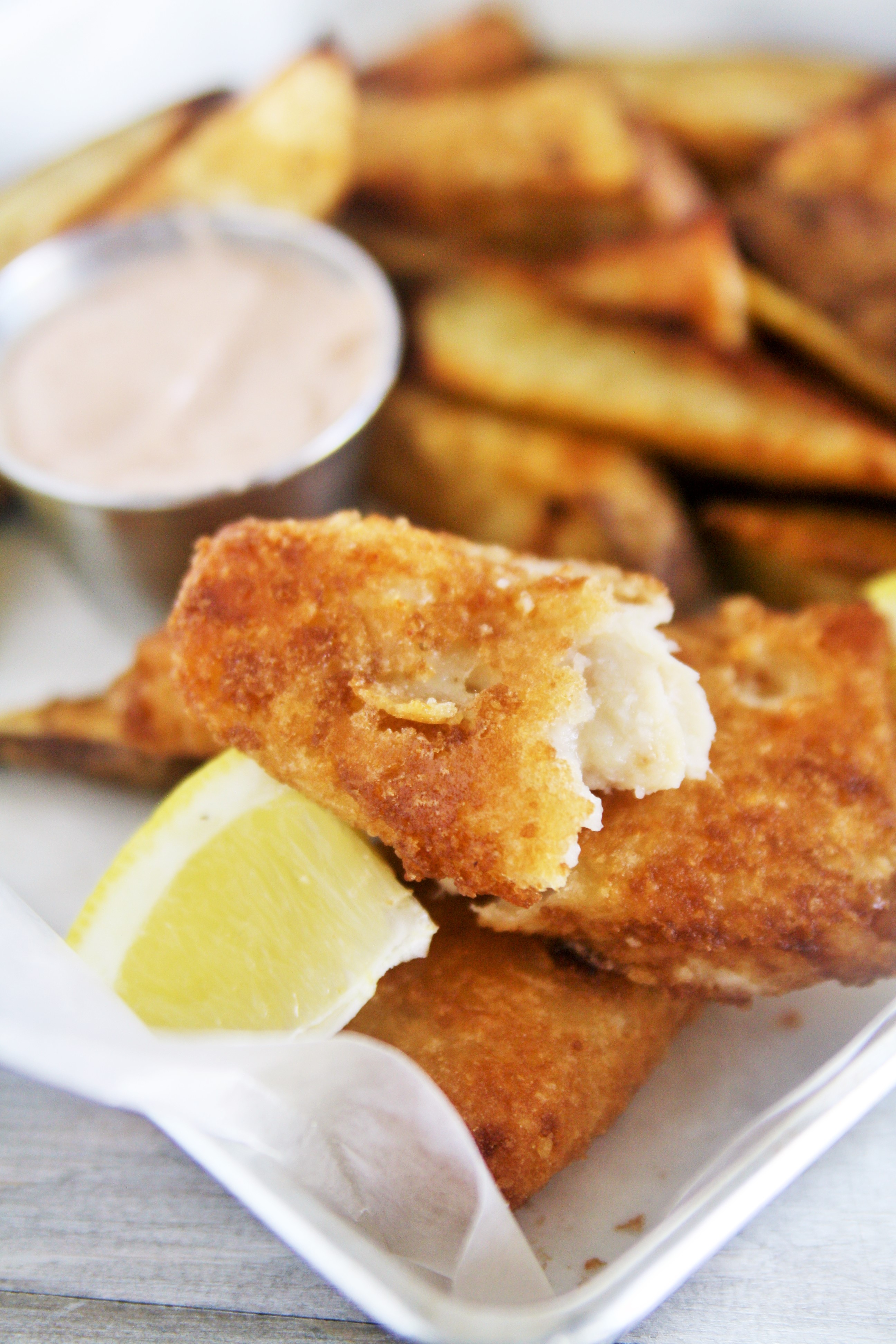 Crispy, golden fillets coated in a zesty beer batter, served with tangy tartar sauce—this Cajin Fish and Chips made with Acadian Redfish is twist on a classic and sure to become your new favorite!