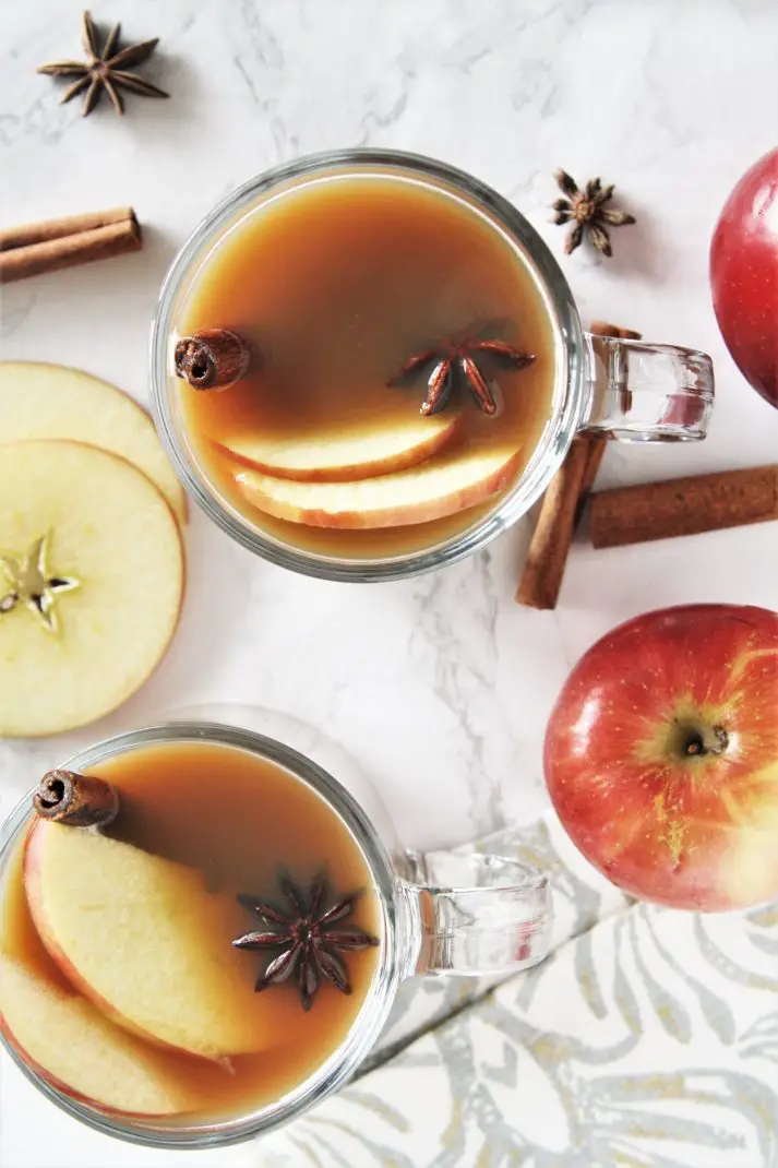 Mulled apple cider with warm spices will warm you up from inside out. This cozy and comforting drink is made in the Instant Pot, and the best part is that it's ready in just 15 minutes of cooking time!