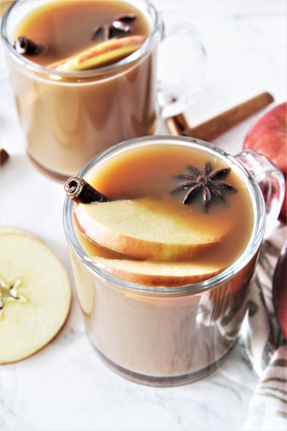 Mulled apple cider with warm spices will warm you up from inside out. This cozy and comforting drink is made in the Instant Pot, and the best part is that it's ready in just 15 minutes of cooking time!