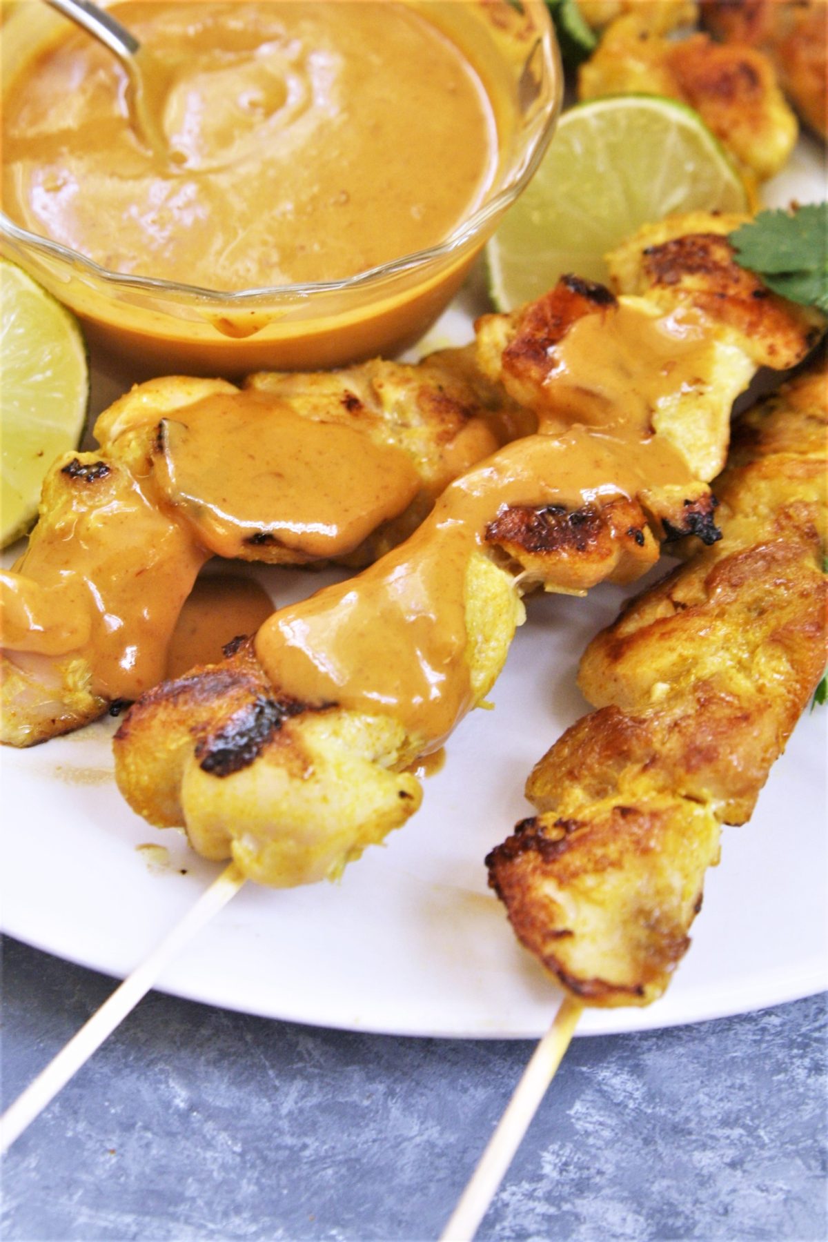 These tender and juicy chicken satay skewers are grilled and served with a creamy Vietnamese peanut sauce for dipping, making it a quick and delicious meal that the whole family will love!