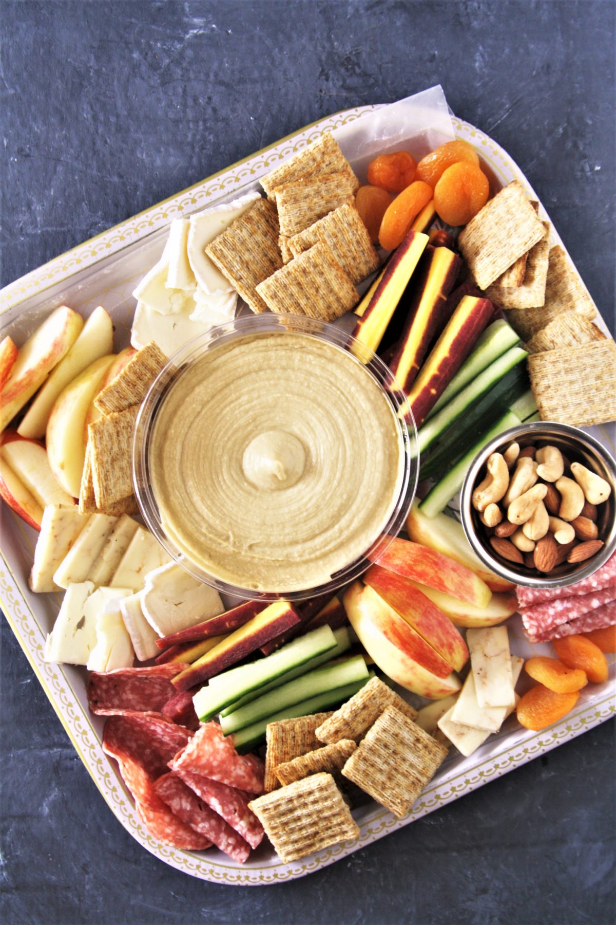 https://www.thetastybiteblog.com/wp-content/uploads/2021/06/picnic-snack-board-1-scaled.jpg