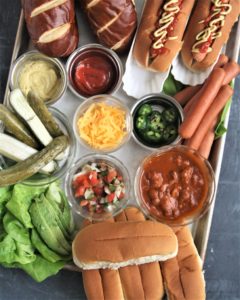 Take your next game day get together to the next level and serve this fun and delicious Build-Your-Own Hot Dog Charcuterie Grazing Boardfor an epic game day eats! 