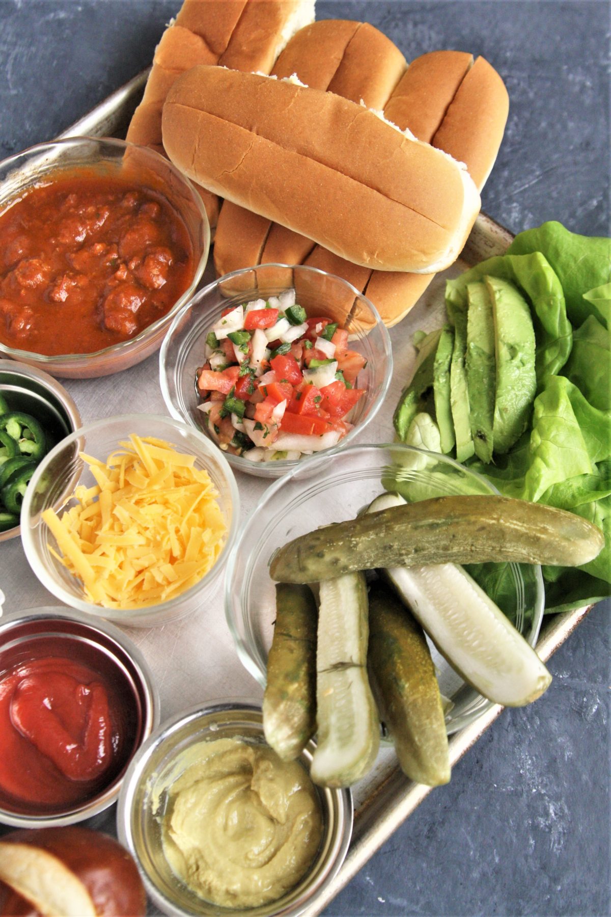 Take your next game day get together to the next level and serve this fun and delicious Build-Your-Own Hot Dog Charcuterie Grazing Boardfor an epic game day eats! 