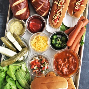 Take your next game day get together to the next level and serve this fun and delicious Build-Your-Own Hot Dog Charcuterie Grazing Boardfor an epic game day eats! 