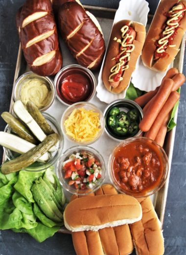 Take your next game day get together to the next level and serve this fun and delicious Build-Your-Own Hot Dog Charcuterie Grazing Boardfor an epic game day eats! 