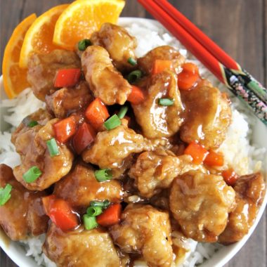 Crispy pieces of fried chicken coated in a delicious sweet and sticky orange sauce, this Panda Express Copycat Orange Chicken will become your new favorite weeknight dinner option!