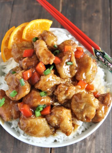 Crispy pieces of fried chicken coated in a delicious sweet and sticky orange sauce, this Panda Express Copycat Orange Chicken will become your new favorite weeknight dinner option!