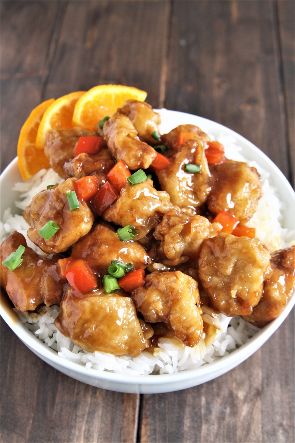 Crispy pieces of fried chicken coated in a delicious sweet and sticky orange sauce, this Panda Express Copycat Orange Chicken will become your new favorite weeknight dinner option!