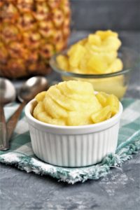 Sweet, creamy, frosty Copycat Disney Dole Whip can easily be made at home with only a few simple ingredients! This pineapple soft serve is the perfect refreshing dessert to enjoy on a hot summer day.
