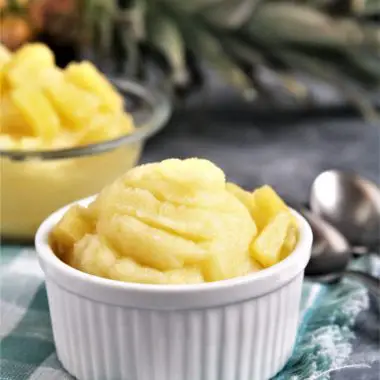 Sweet, creamy, frosty Copycat Disney Dole Whip can easily be made at home with only a few simple ingredients! This pineapple soft serve is the perfect refreshing dessert to enjoy on a hot summer day.