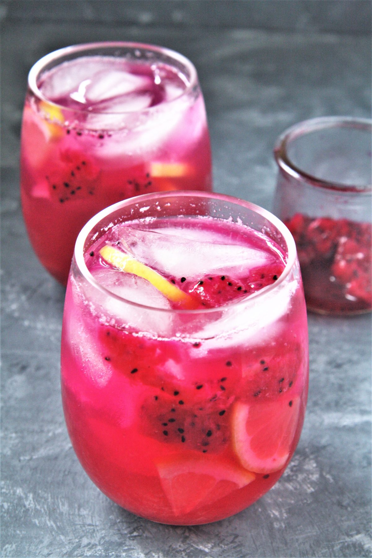 Featuring bold tropical flavors, this Starbucks Copycat Mango Dragonfruit Lemonade Refresher is a refreshing drink that you can make at home and enjoy all year round!