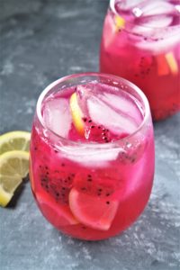 Featuring bold tropical flavors, this Starbucks Copycat Mango Dragonfruit Lemonade Refresher is a refreshing drink that you can make at home and enjoy all year round!