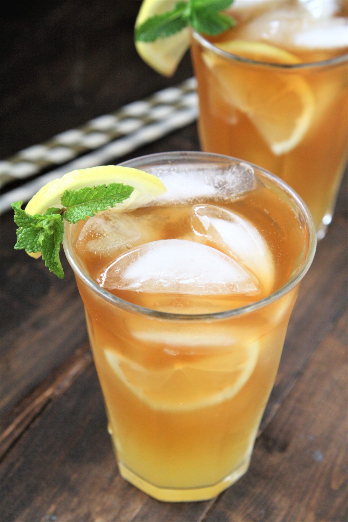 This half iced tea and half lemonade or Arnold Palmer drink recipe combines freshly brewed sweet iced tea with refreshing lemonade for the perfect drink to quench your thirst!