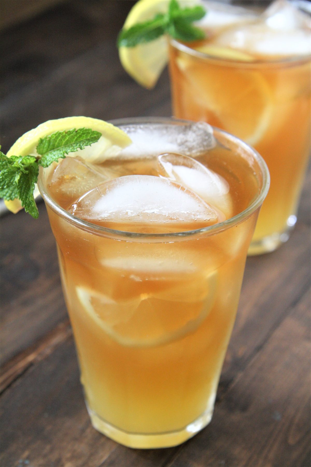 This half iced tea and half lemonade or Arnold Palmer drink recipe combines freshly brewed sweet iced tea with refreshing lemonade for the perfect drink to quench your thirst!