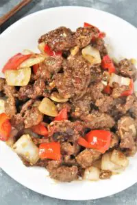 Crispy strips of beef tossed in an addictive sweet and spicy sauce with onions and peppers, this Panda Express Copycat Beijing Beef will become a dinner staple your family will love!