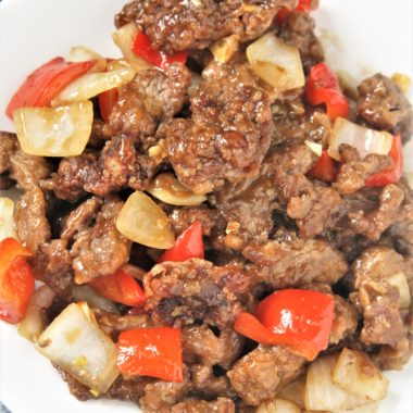 Crispy strips of beef tossed in an addictive sweet and spicy sauce with onions and peppers, this Panda Express Copycat Beijing Beef will become a dinner staple your family will love!