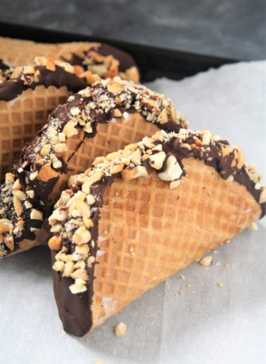 This homemade Choco Taco with taco-shaped waffle cone is filled with vanilla ice cream and topped with chocolate shell and peanuts, just like the iconic treat - the best part is it only requires 4 ingredients!