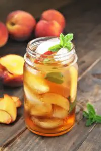 Combine fresh juicy peaches, tea, and a secret ingredient for the ultimate classic Southern drink. Southern Peach Sweet Tea is a delicious, refreshing drink, perfect for barbecues and hot summer days!