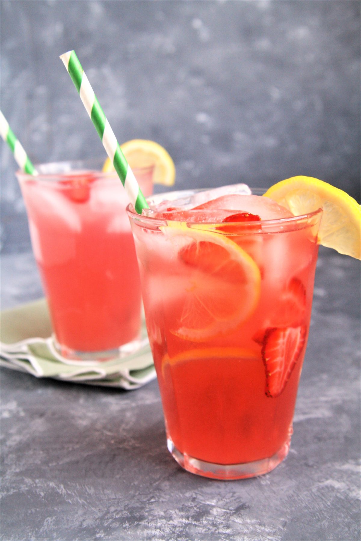 Make this Starbucks Copycat Strawberry Acai Lemonade Refresher right at home! Sweet, tangy, and thirst-quenching, it's the perfect summertime drink to cool you down on a hot day.