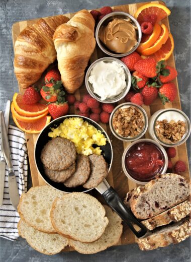 Take your next breakfast or weekend brunch to the next level and serve this fun, delicious, and beautiful breakfast grazing board with a variety of favorite breakfast foods.