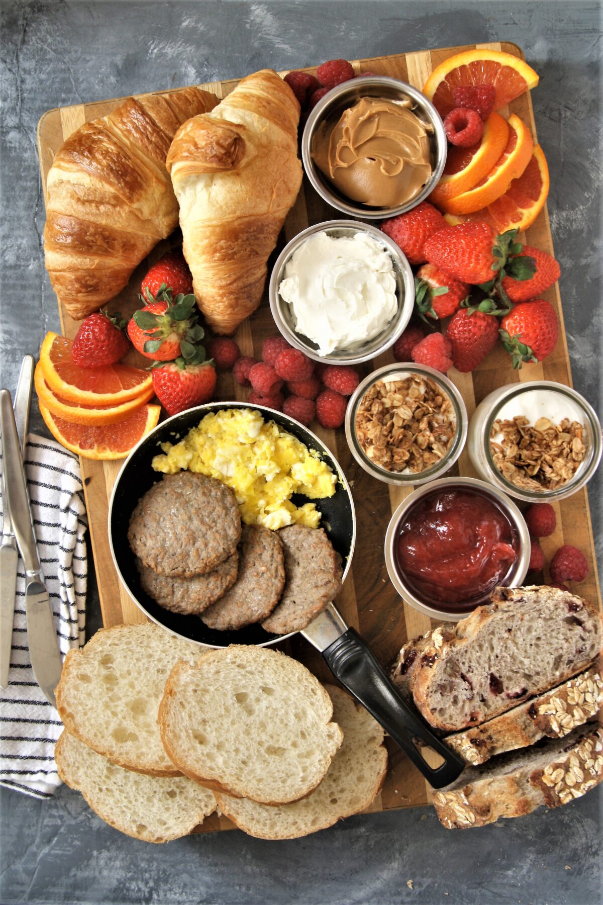 Take your next breakfast or weekend brunch to the next level and serve this fun, delicious, and beautiful breakfast grazing board with sweet and savory eats.