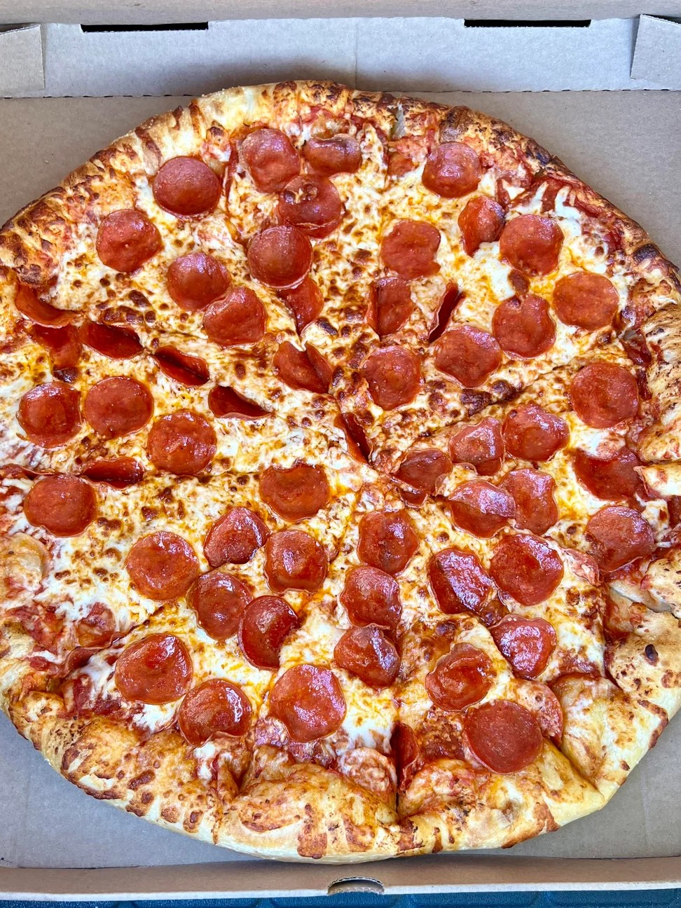 Discover the best hack to order a whole Costco pizza ahead of time, skip the main store line, and enjoy your favorite food court pizzas quickly.