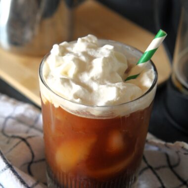 Upgrade your iced coffee with a swirl of Irish cream syrup, topped with sweet cream cold foam and a hint of cocoa powder. You can make this seasonal Starbucks copycat recipe at home and enjoy it all year round.