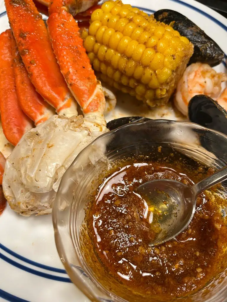 Recreate the mouthwatering flavors of Juicy Crab Seafood Boil combined with delectable Cajun butter sauce right at home with these easy-to-follow steps -- get ready to spice up your kitchen and your taste buds!