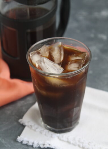 Discover how to craft your own Blue Bottle Cold Brew Coffee at home and enjoy a smooth, rich coffee with lower acidity than regular brews using the cold brewing method with just two ingredients: coffee and water!