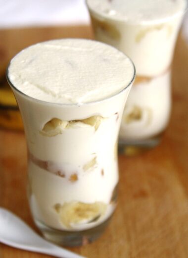 This homemade version of the iconic Copycat Magnolia Bakery Banana Pudding dessert layers Nilla wafers, fresh bananas, and a rich whipped cream mixture, creating a mouthwatering treat perfect for any occasion.
