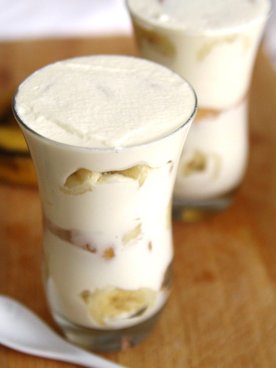 This homemade version of the iconic Copycat Magnolia Bakery Banana Pudding dessert layers Nilla wafers, fresh bananas, and a rich whipped cream mixture, creating a mouthwatering treat perfect for any occasion.